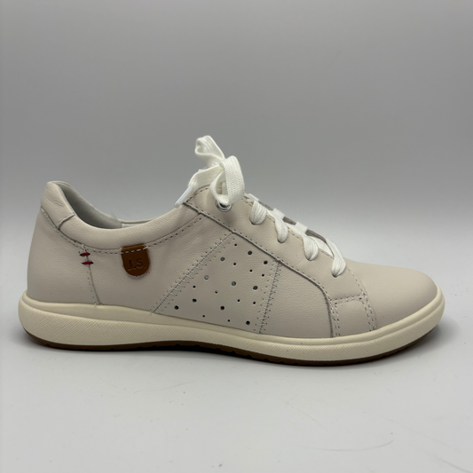 Beige sneaker with white laces on a gray background
