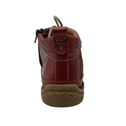 Back view of red leather shoe with tan laces and tan outsole