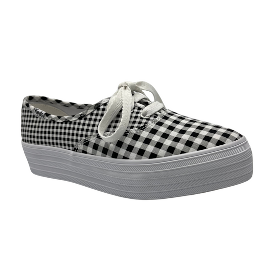 45 degree angled view of platform, pointed toe sneaker with white laces and black and white gingham design