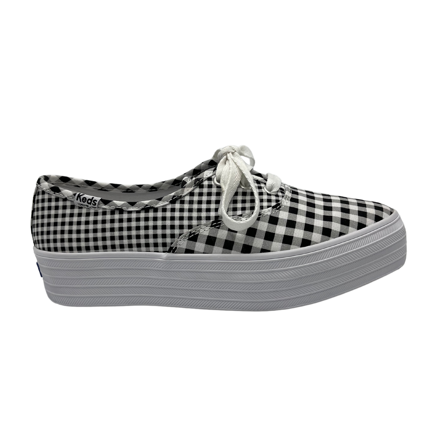 Right facing view of platform, pointed toe sneaker with white laces and black and white gingham design
