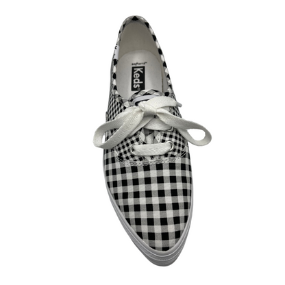 Top view of platform, pointed toe sneaker with white laces and black and white gingham design