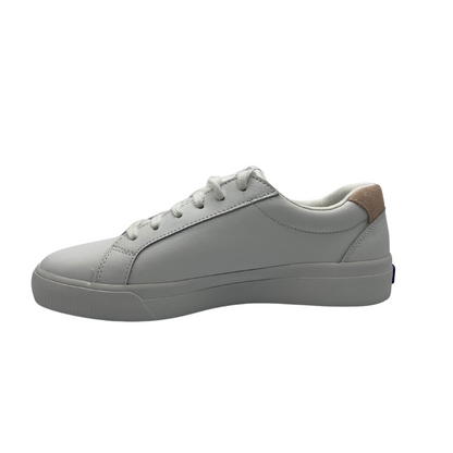 Left facing view of white leather sneaker with padded collar and tongue and white rubber outsole