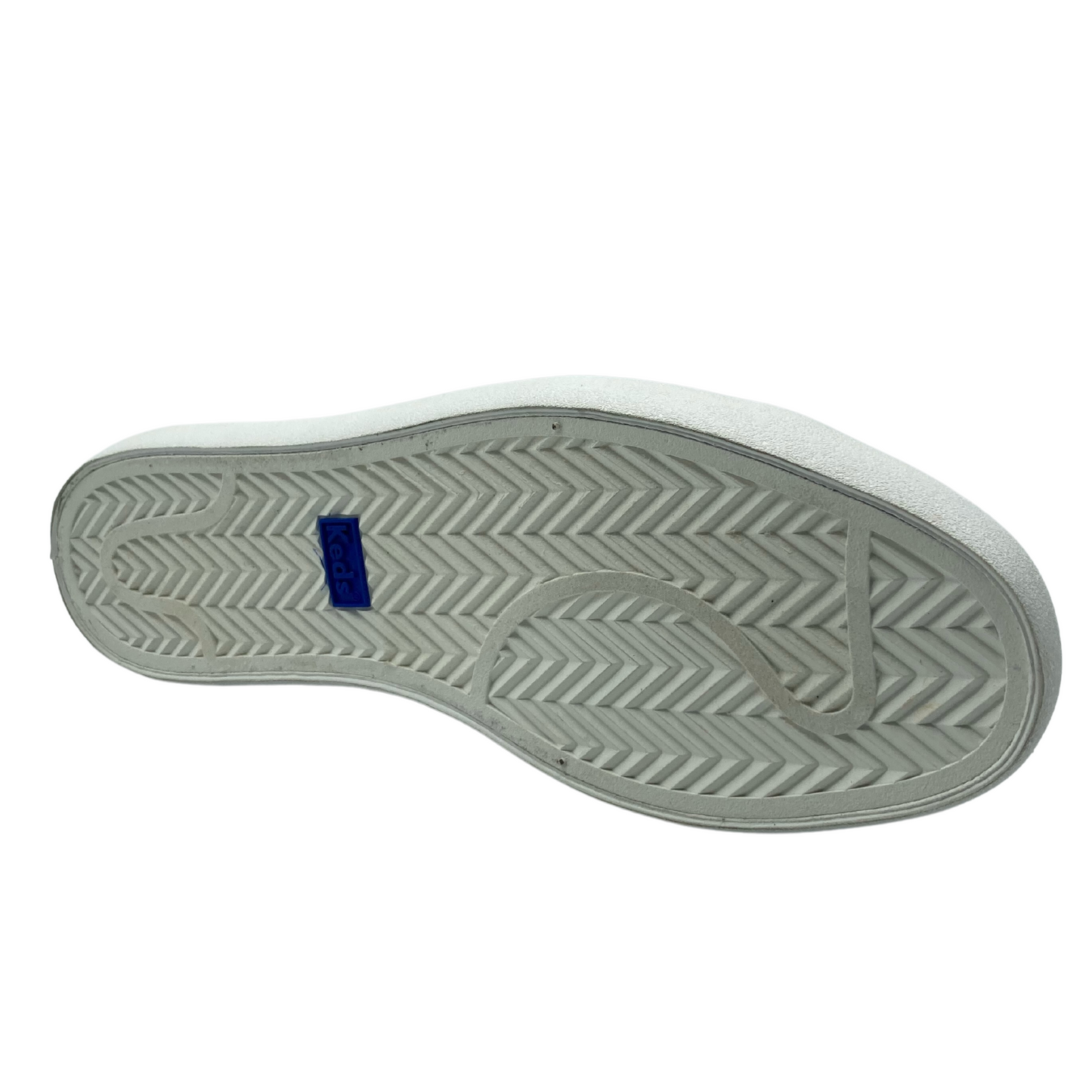 Bottom of the pull on sneaker with white tread and small rectangular blue logo