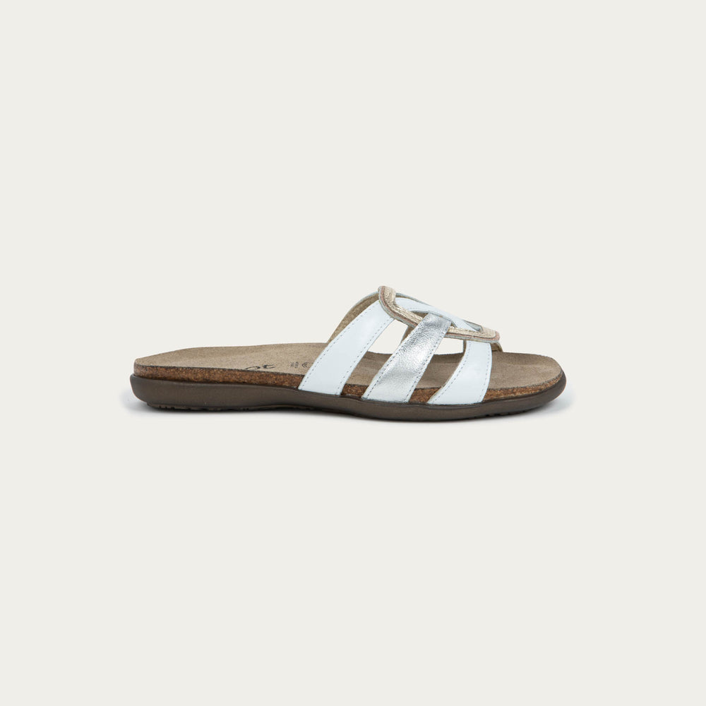 White sandal with a strap on a light gray background