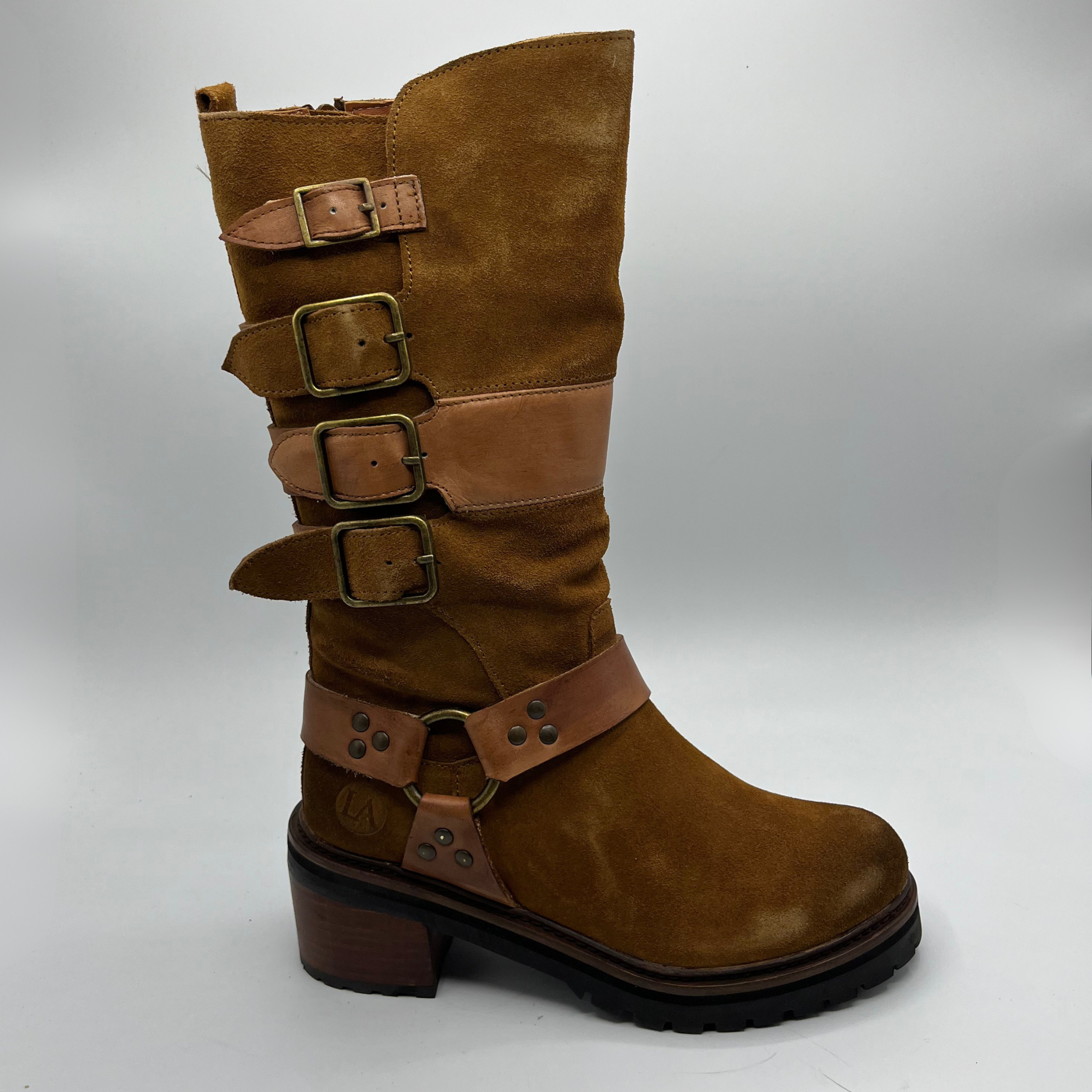Brown boot with multiple straps and buckles on a white background