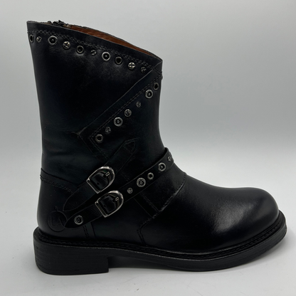 Black leather boot with buckles on a gray background