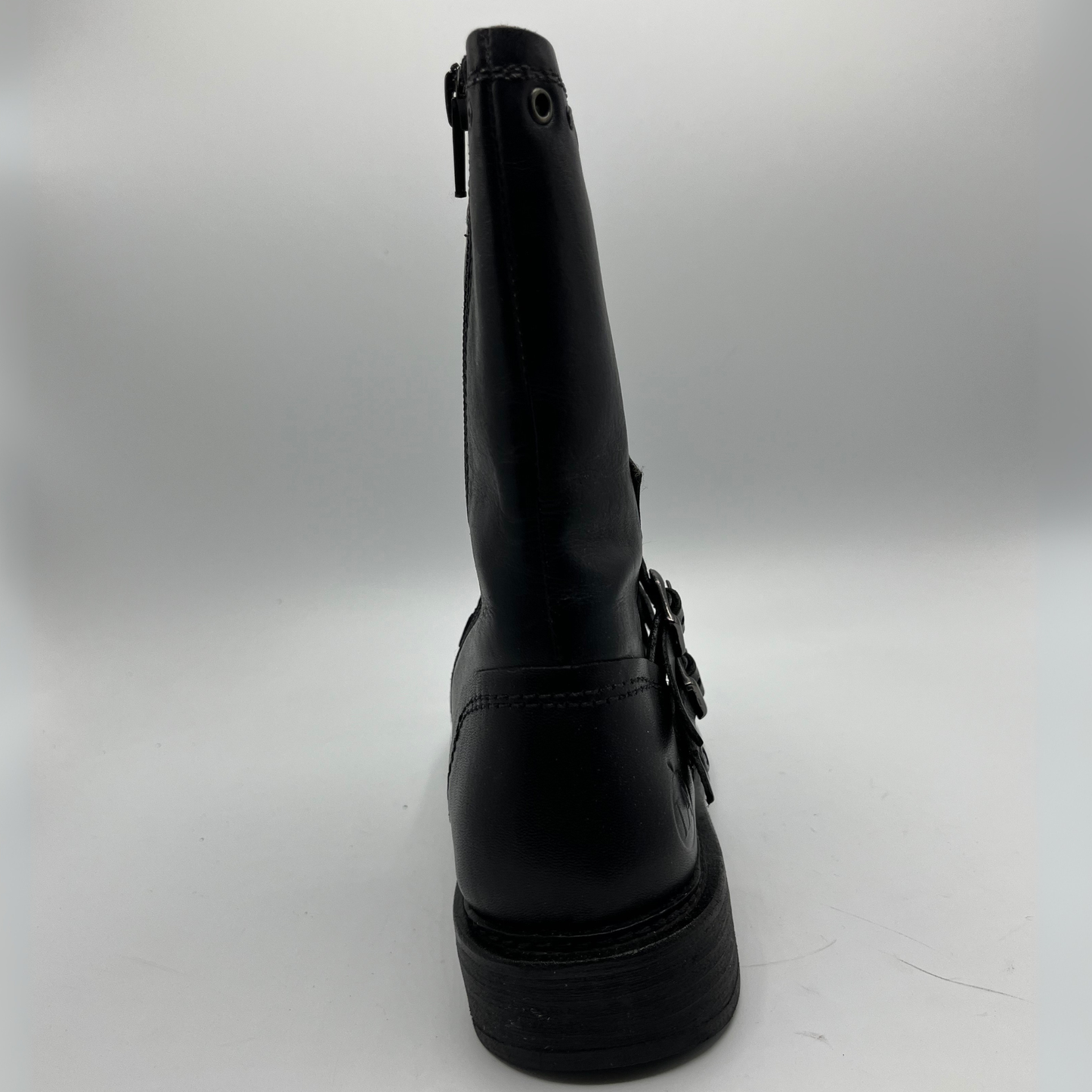 Black boot on a white background