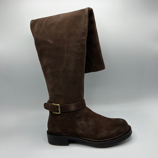 Brown suede boot with a buckle on a white background