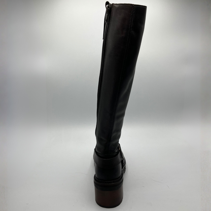 Black knee-high boot on a light gray background