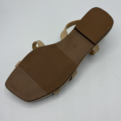 Brown sandal on a white background
