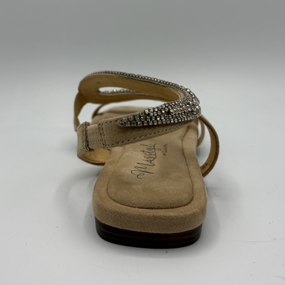 Beige sandal with rhinestone strap on a white background