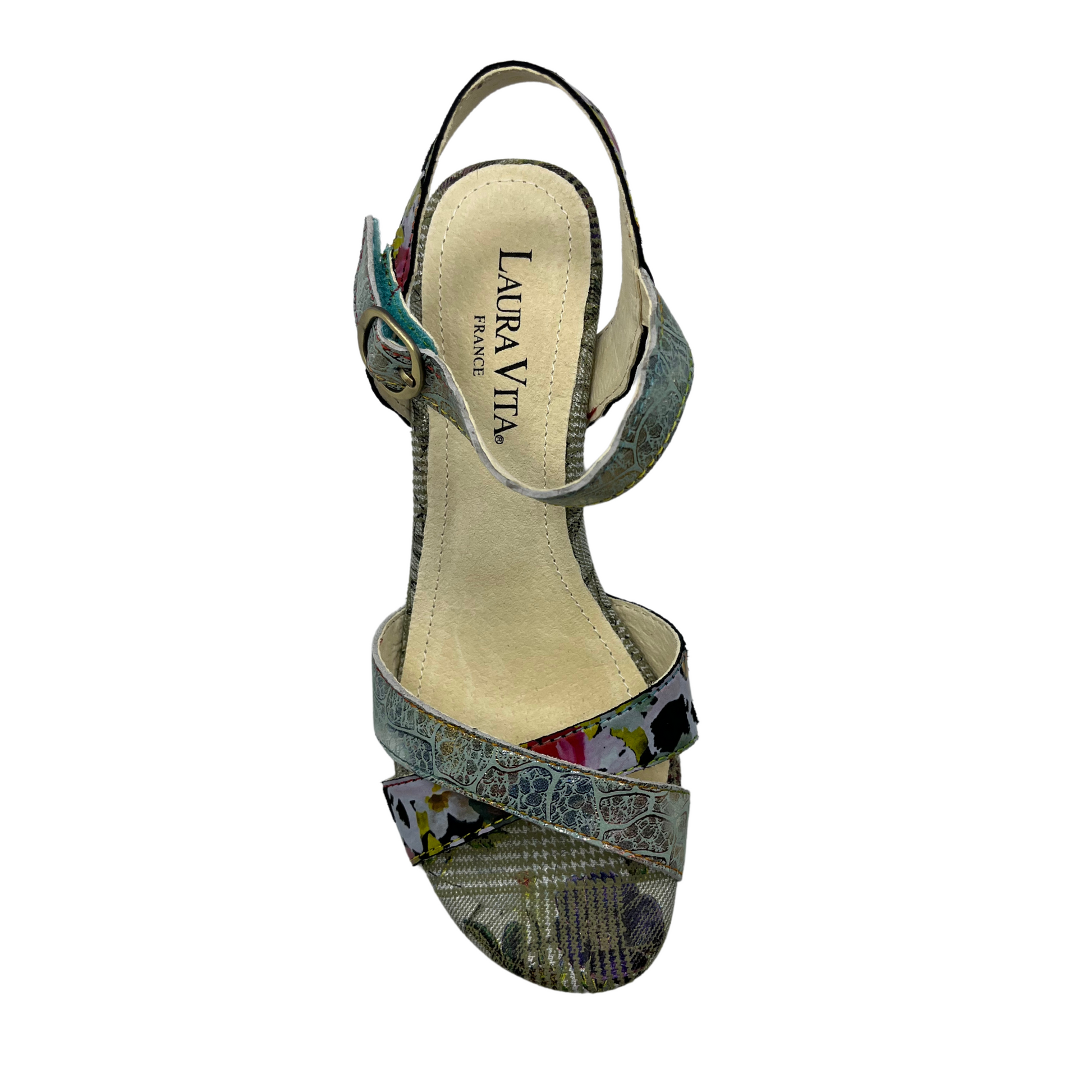 Top view of patterned leather sandal with buckle ankle strap, crossed straps on toe and block lucite heel
