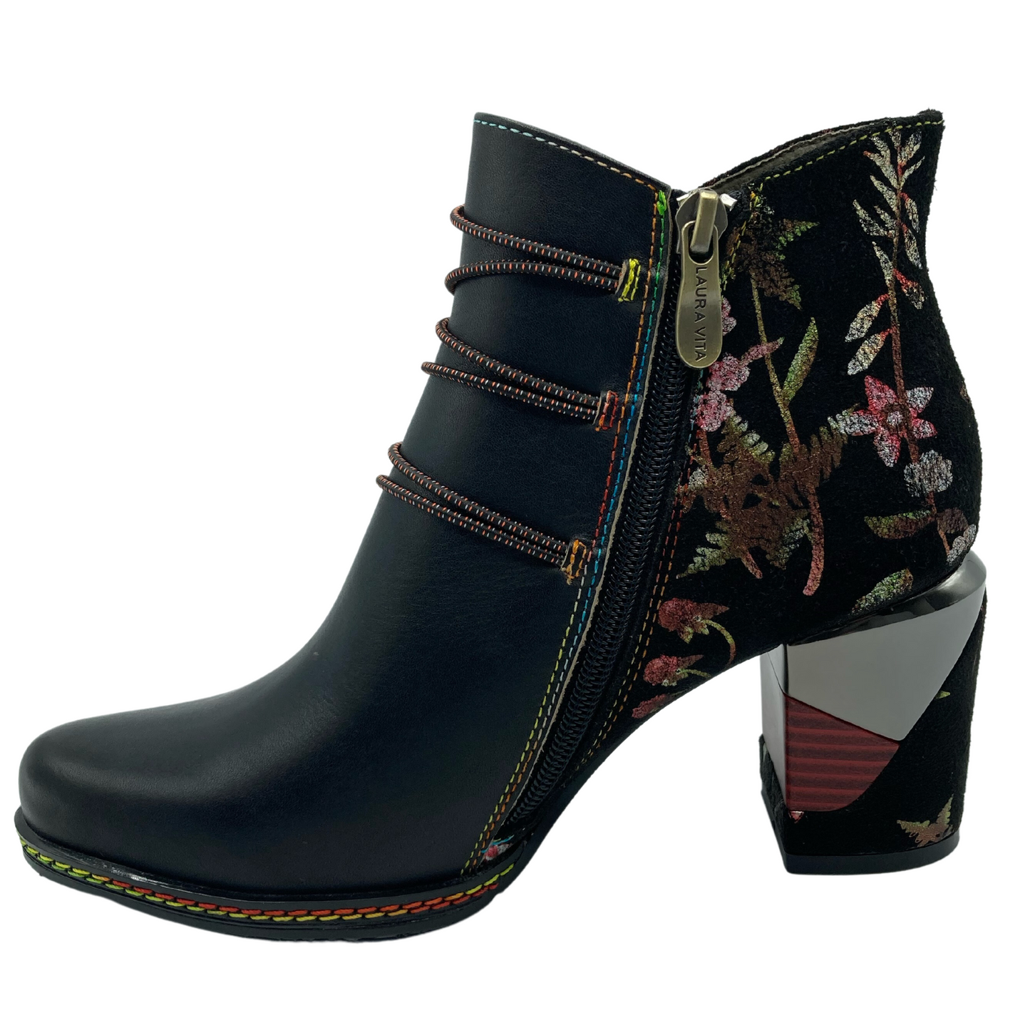 Left facing view of floral and black leather ankle boot with side zipper closure and block heel