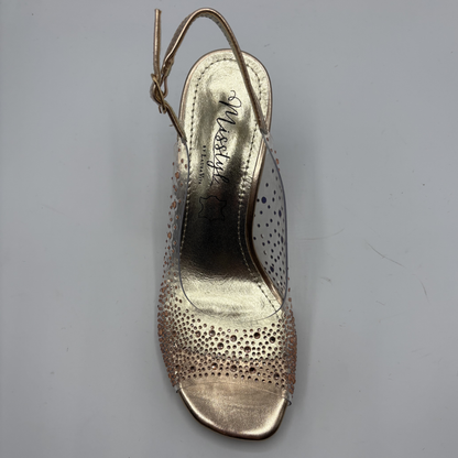 Rose gold sandal with peep-toe design on a gray background