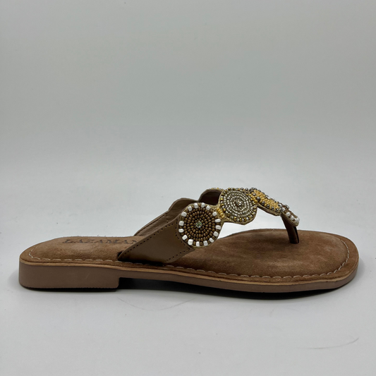 Right facing view of a beaded strapped, thong sandal with a suede wrapped footbed and lightweight rubber outsole.