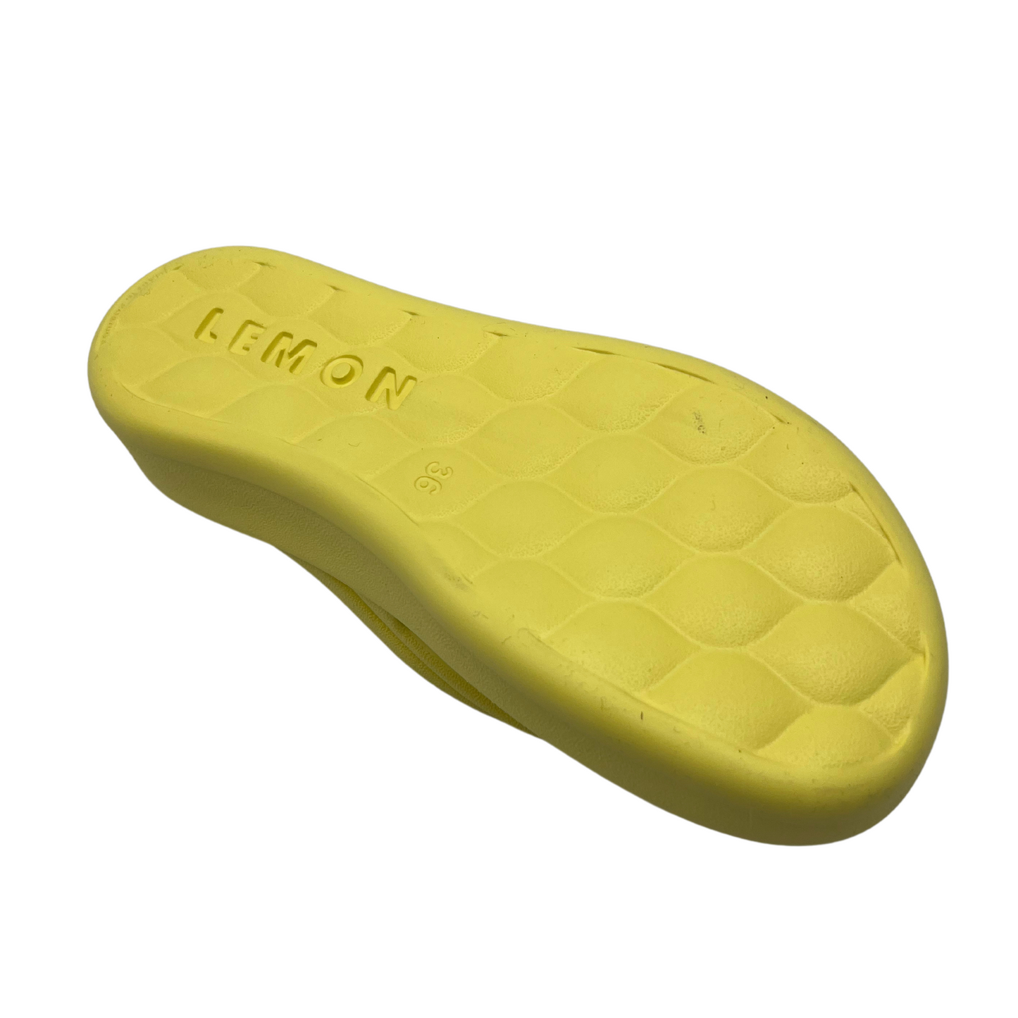 Bottom view of lemon yellow thong sandal with cushioned foam insole and platform sole