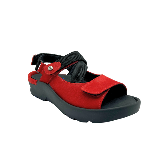 Angled front view of a bright red leather sandal.
