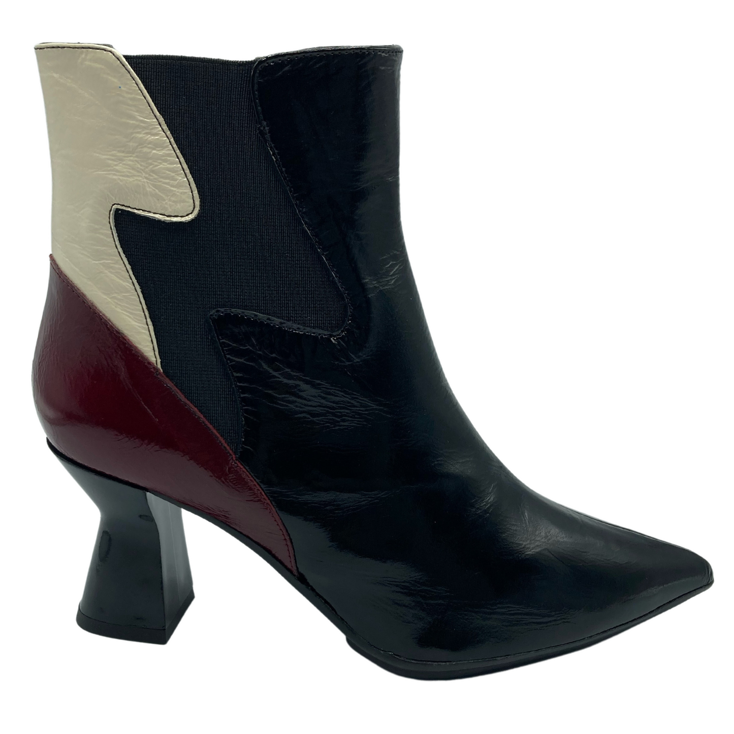 Right facing view of black leather ankle boot with white and red leather details on shaft