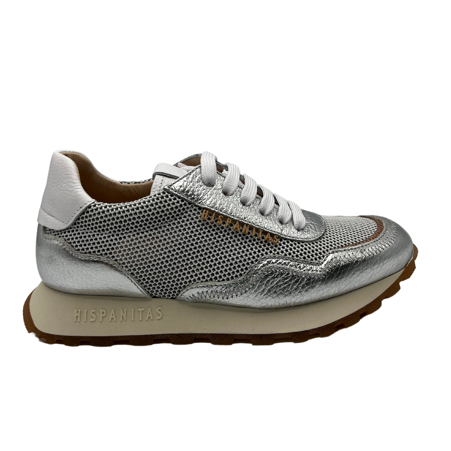 Right facing view of silver and white leather sneaker with non-slip sole and leather lining.