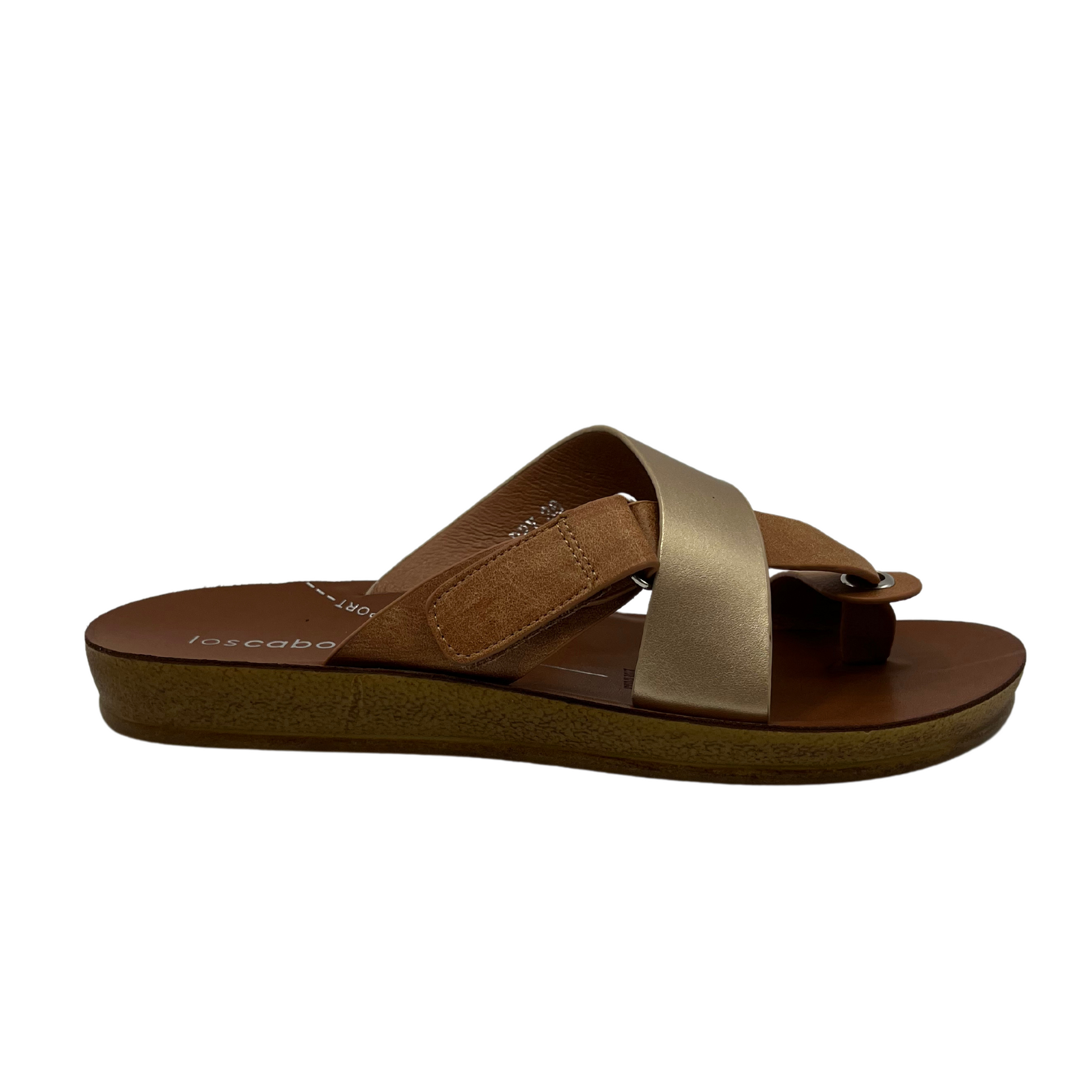 Right facing view of brown and gold strapped sandal with toe strap and velcro closure