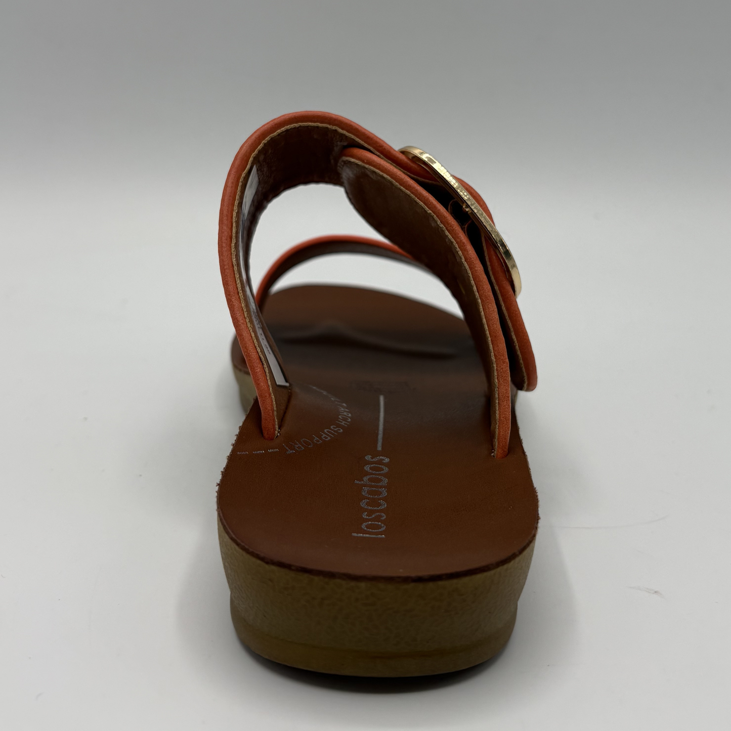 Back view of a tangerine coloured sandal with two straps