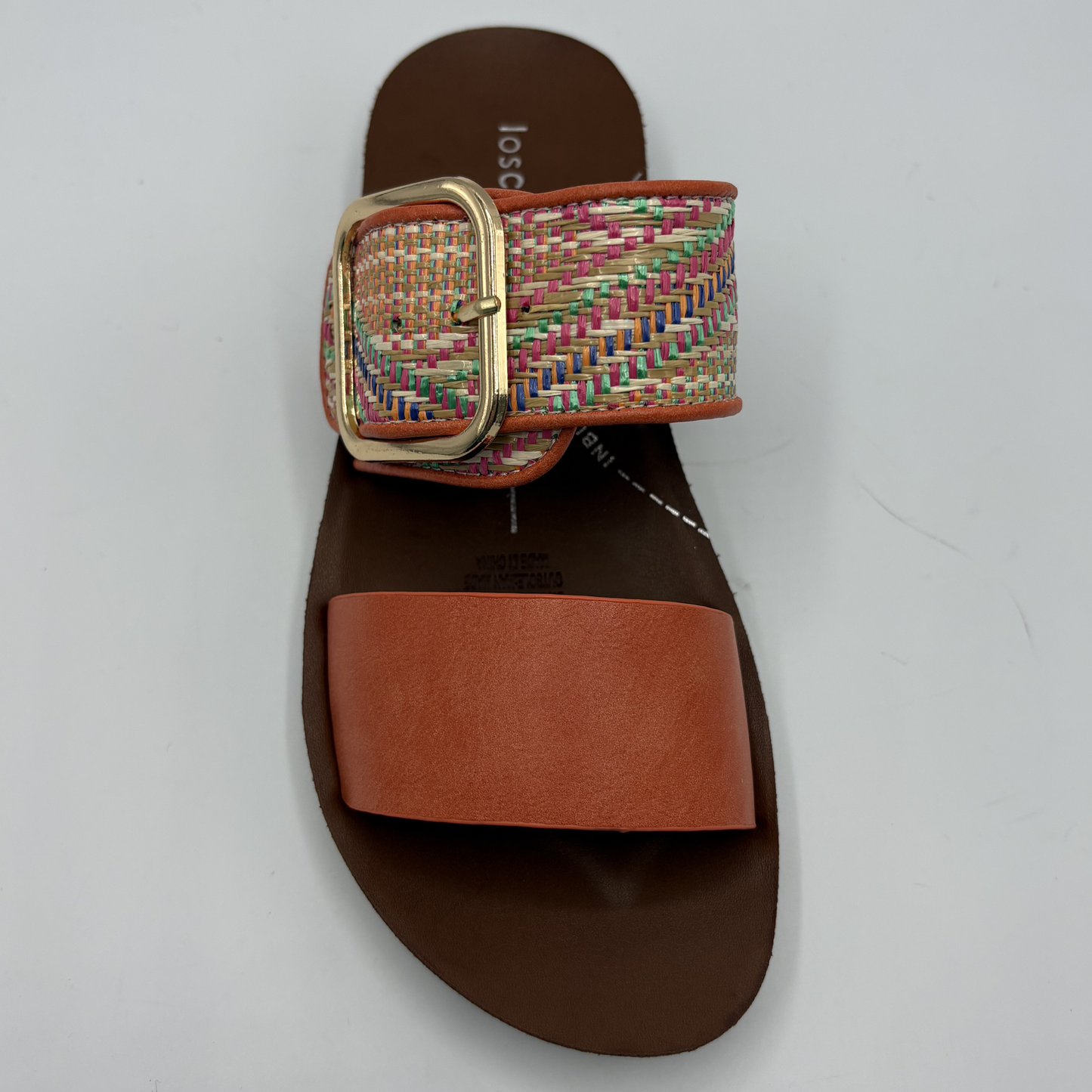 Top view of a tangerine coloured sandal with two straps