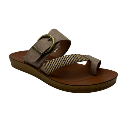 45 degree angled view of taupe leather sandal with gold buckle and brown insole