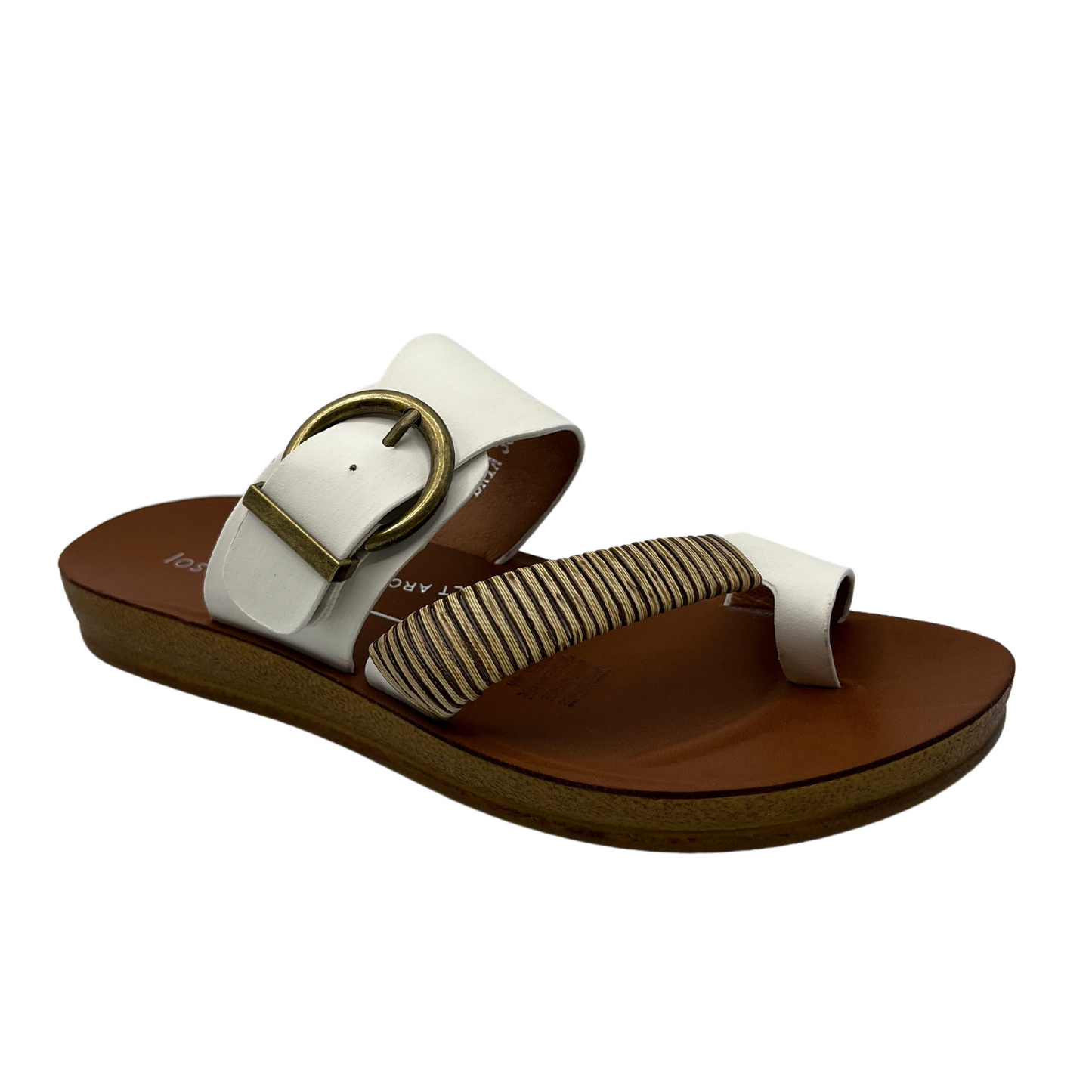 45 degree angled view of white leather sandal with gold buckle and brown insole