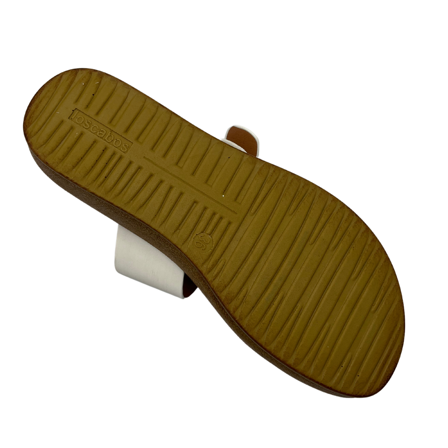 Bottom view of white leather sandal with gold buckle and brown insole