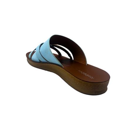 Rear view of a slip on sandal in a chalk blue leather.  Open toe and heel.