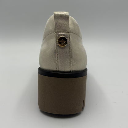 Back view of a metallic leather loafer with a rubber outsol
