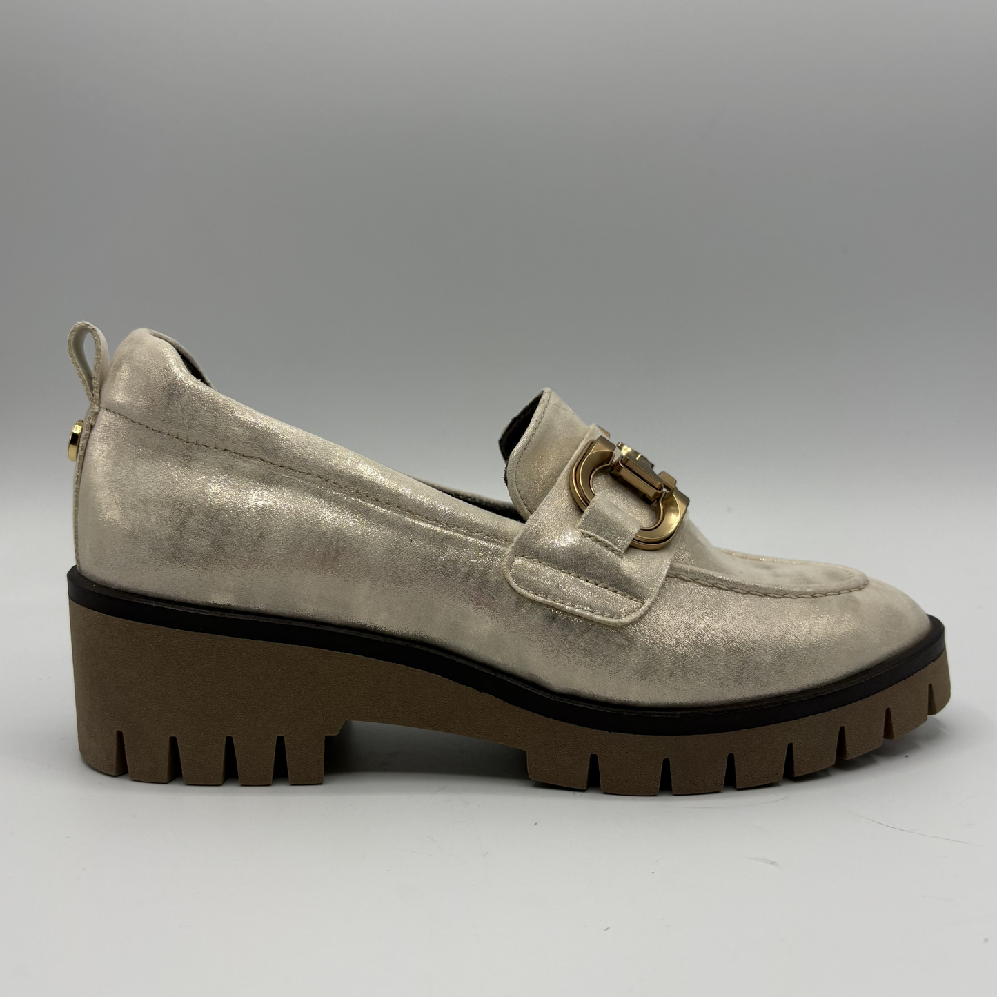 Right facing view of a metallic leather loafer with a rubber outsole