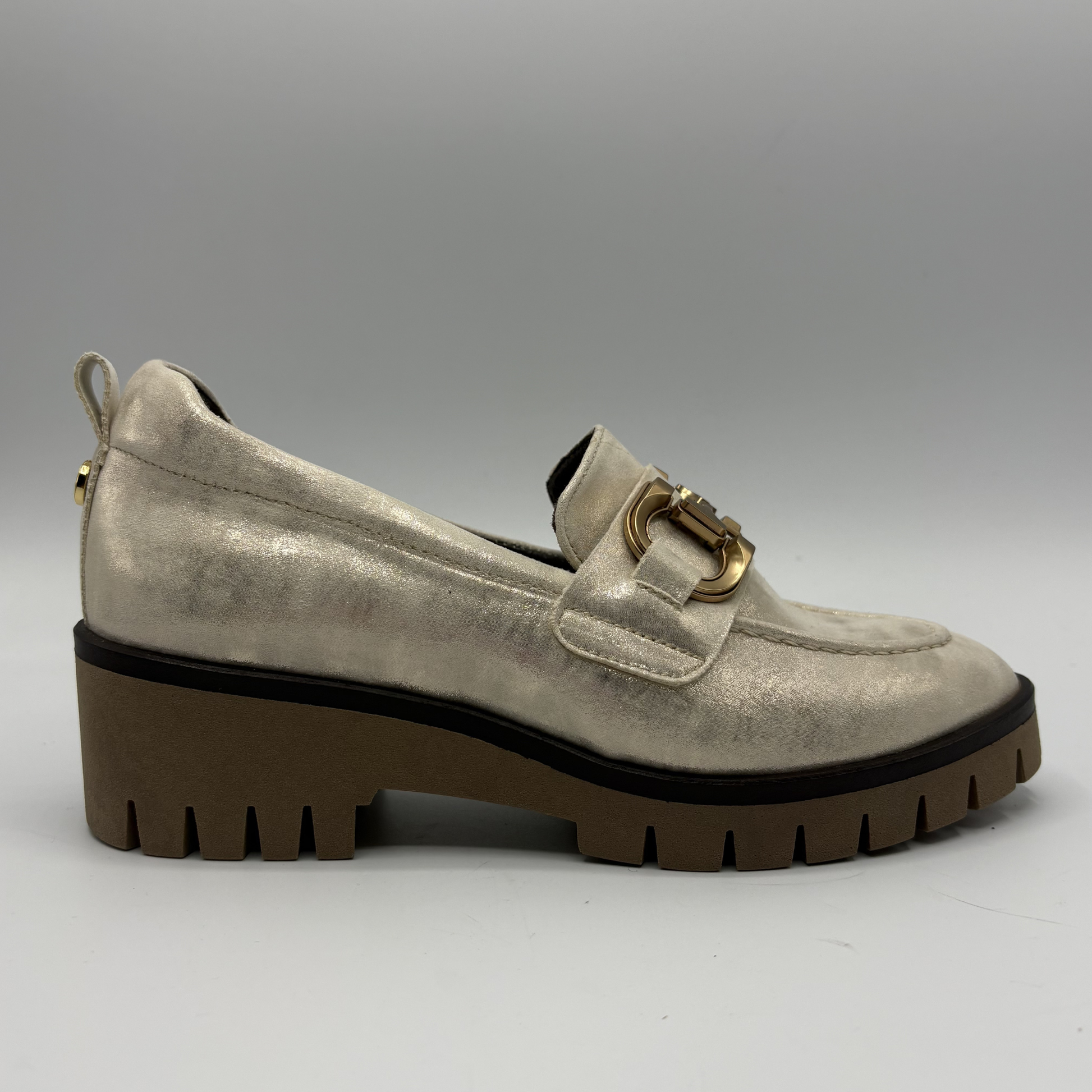 Right facing view of a metallic leather loafer with a rubber outsole