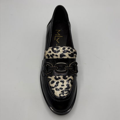 Top view of a black leather loafer with an animal print accent on the toe box and chain detail.