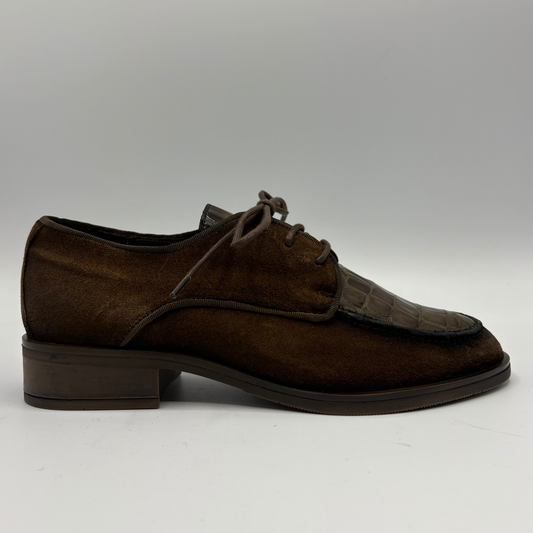 Right facing view of a brown oxford shoe with a short stacked heel and matching laces