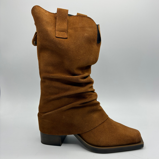 Right facing view of a brown suede western style slouchy boot