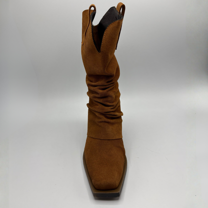 Front facing view of a brown suede western style slouchy boot