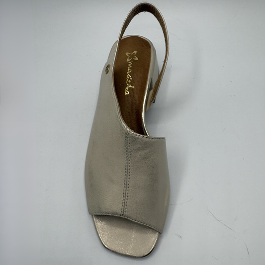 Beige sandal on a light gray background
