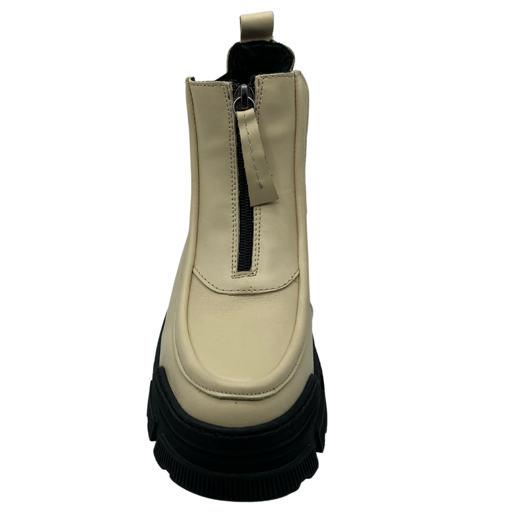 Top view of beige leather short boot with upper zipper closure and black chunky rubber outsole