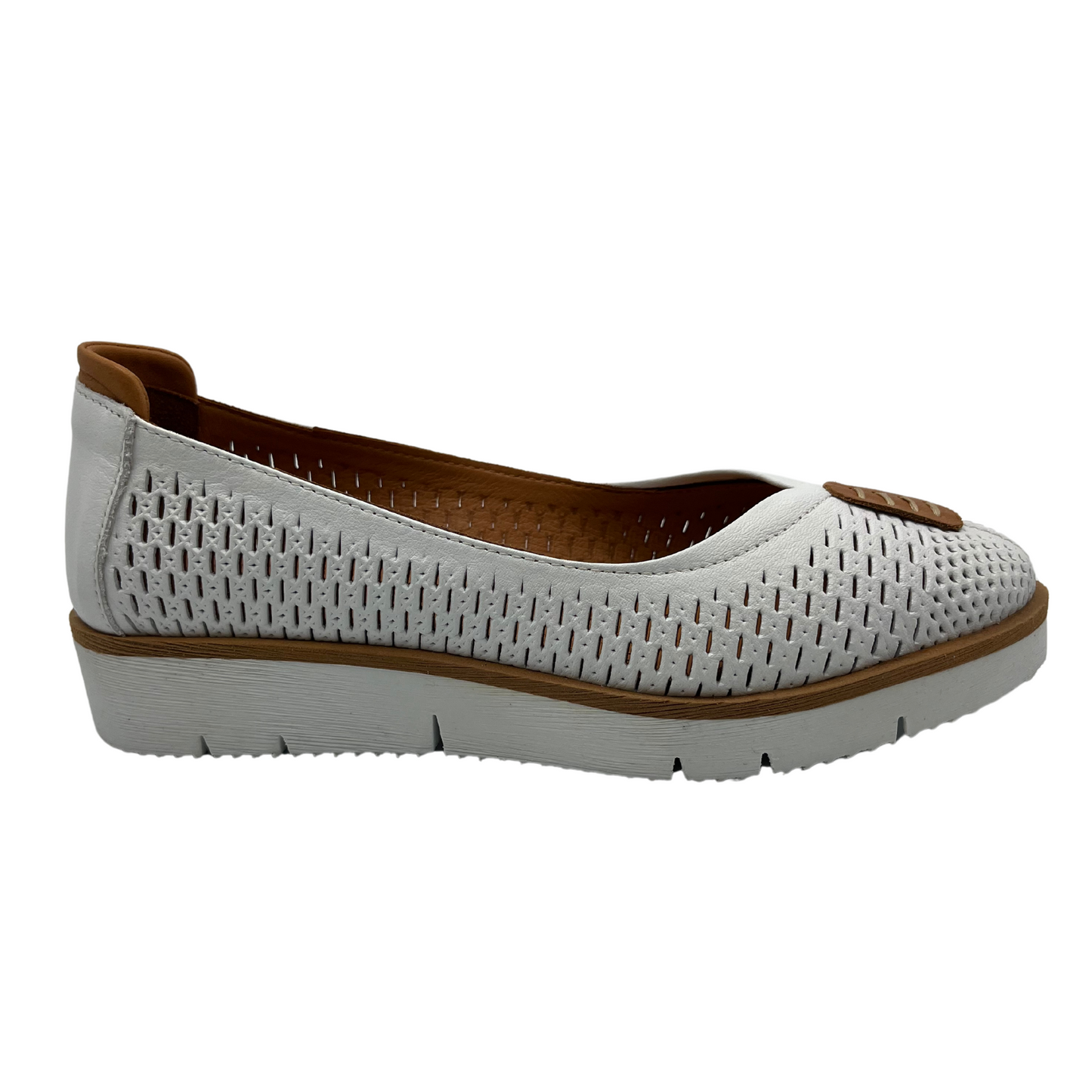 Right facing view of white perforated leather flat with thick outsole and leather lining