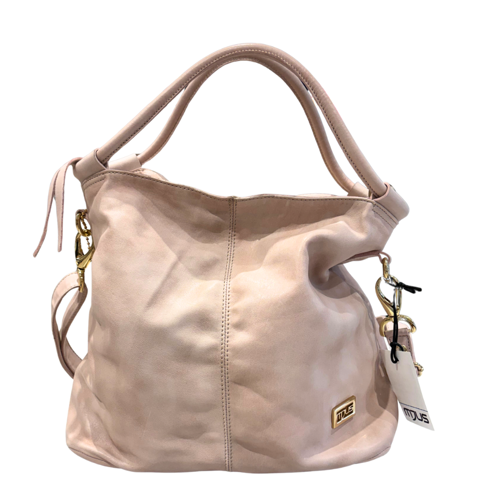 Soft pink handbag with a visible brand tag on a white background