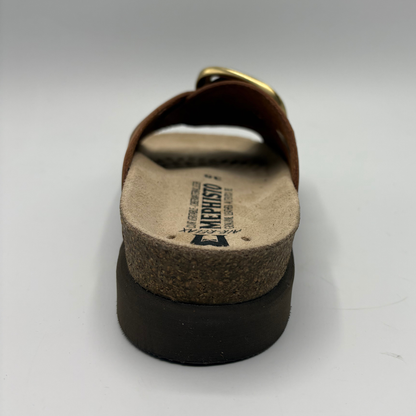 Brown sandal with cork sole on a white background