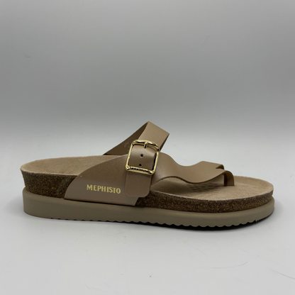 Brown sandal with a gold buckle on a gray background