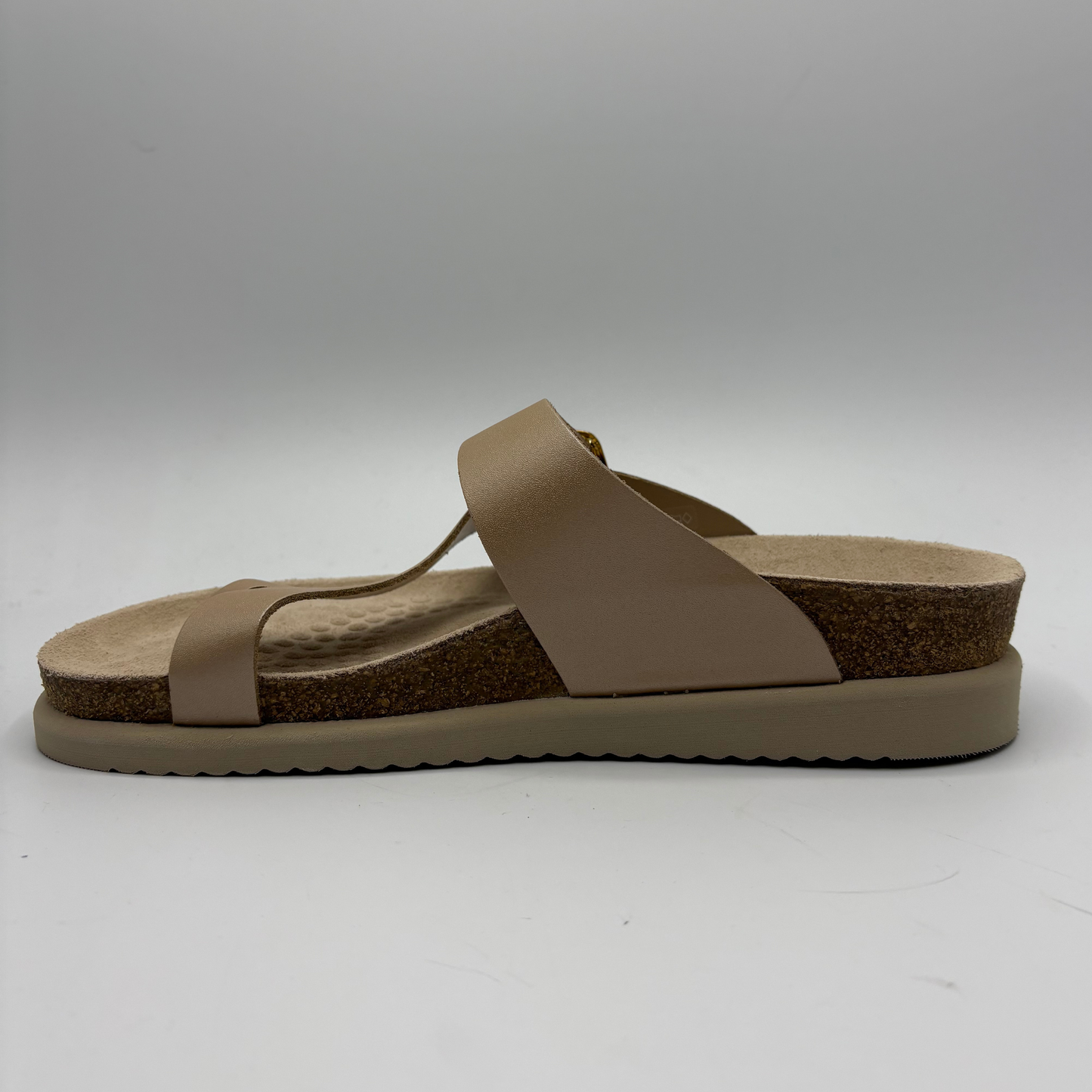Beige sandal with cork sole on a white background