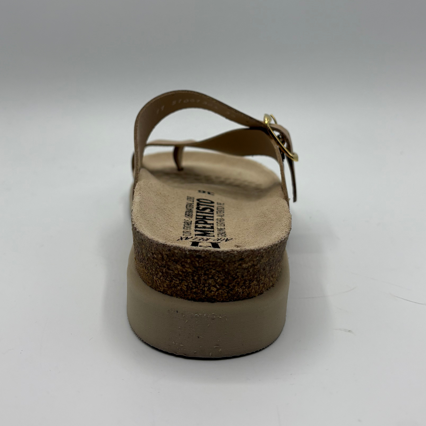 Brown sandal with cork sole on a white background