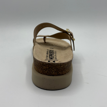 Brown sandal with cork sole on a white background