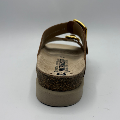 Brown sandal with cork sole on a white background