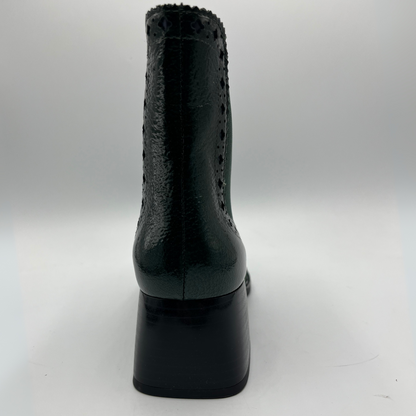 Black high-heeled shoe on a white background