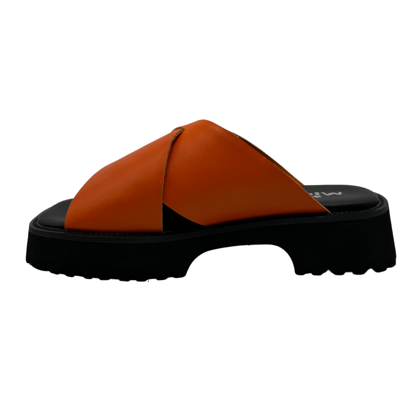 Left facing view of orange leather sandal with thick black sole, cross over straps and open toe