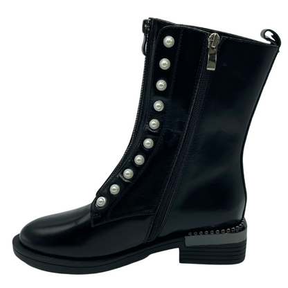 Left facing view of black leather boot with side zipper closure and pearl details